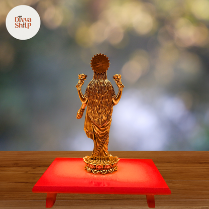 Elegant Lakshmi brass murti with detailed ornamentation for pooja room
